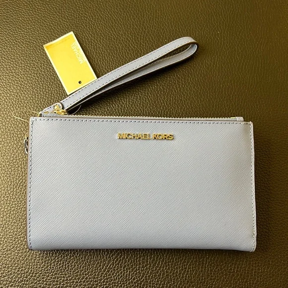 Michael Kors | Bags | Michael Kors Wristlet Brand New | Poshmark Brand new with tags, Michael Kors wristlet main image 0